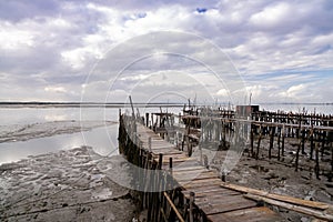 View of the broken old docks and piers at Cais Palatifico on the Sado River Estuary