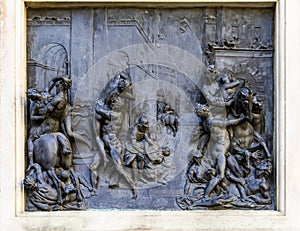Bronze plaque at statue The Rape of the Sabine Women by Giambologna at Loggia dei Lanzi in Florence, Italy photo
