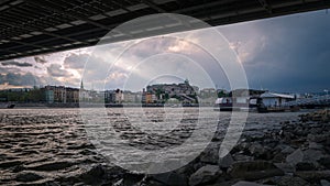 View of Budapest from the bank of Danube river under Elisabeth bridge with the castle in the background, Hungary