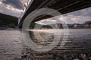 View of Budapest from the bank of Danube river under Elisabeth bridge with the castle in the background, Hungary