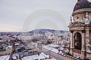 View of Budapest from St. Stephens Basilica, Budapest, Hungary on a snowy foggy day