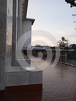 view of the building in the evening with the evening sky in the ba ckground