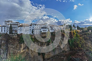 view of the buildings on the edge of the cliff of tajo de ronda , malaga spain