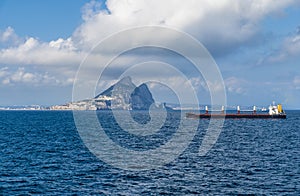 A view of a bulk carrier vessel sailing through the Straits of Gibraltar