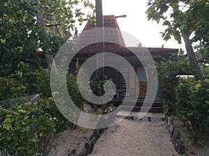 View of the Bungalow of a hotel room on Beachcomber island in the Pacific ocean