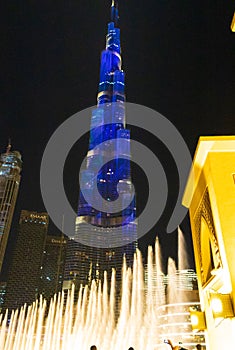 Night view Burj Khalifa and Dubai fountain jets UAE