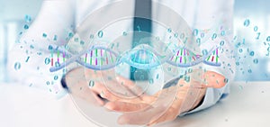 Businessman holding a 3d rendering data coded Dna with binary file around