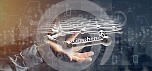 Businessman holding a graphene structure - 3d rendering