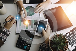 View of a Businessman usng a smartphone with a 3d render Stock exchange trading data information display on a futuristic interface