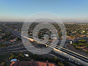 View of a bustling cityscape, overpass bridge 
in Gaborone, Botswana, Africa