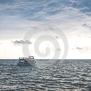 View from cabin Seascape picture. The sky with clouds, waves on the sea surface. Pleasure boat went out to sea photos