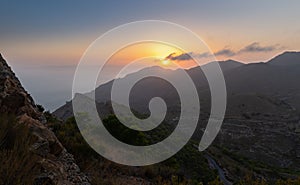 View from the Cabo Tinoso mountain to the Costa Calida at sunset. photo