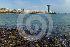 A view from the Cactus park across the bay of Reducto beach in Arrecife, Lanzarote photo