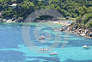 A view of Caldane bay and beach in Giglio Island, Italy photo