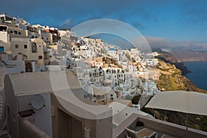 View of Caldera volcanic cliff at sunset, Imerovigli village, Santorini island