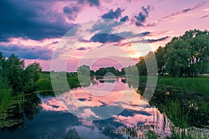 View of a calm lake in the evening