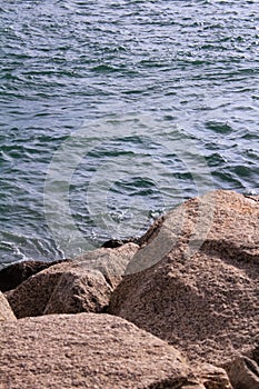 The view of the calm seascape in the seaside on the rocks