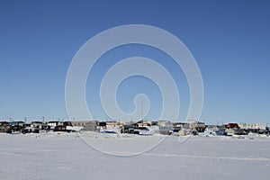 View of Cambridge Bay, Nunavut during a sunny winter day