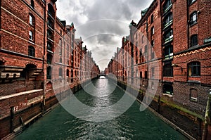 View of canal in Hamburg famous old Speicherstadt distric