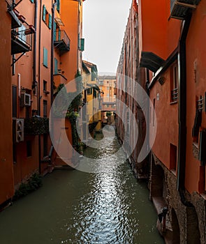 View on the canal on Via Piella, in Bologna, Italy. The old city`s canal which still runs under the town. Travel and tourism plac photo