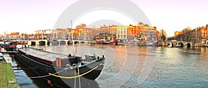 View of the canals with bridge in Amsterdam