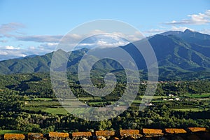 View of Canigou massif from rooftop in village of Eus, France