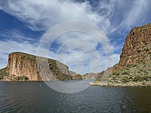 View of Canyon Lake, Dam and Rock Formations from a Steamboat in Arizona photo