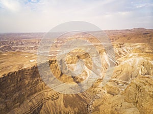 view of canyon from the top of the Masada National Park, the ruins of the palace of King Herod's Masada in the Dead Sea region of