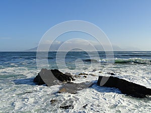 View of Cape Town with the table cloth on Table Mountain from Robben Island