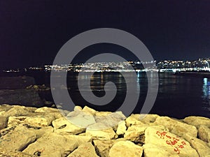 View of Capo Posillipo from Castel dell'Ovo by night. photo