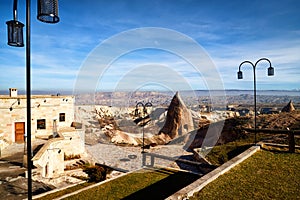 View on Cappadocia rock houses, caves and ruins in Goreme in Anatolia, Turkey. Ruins of an ancient city. The concept of the