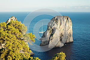 View of Capri's Faraglioni, natural rocks emerged from the sea.