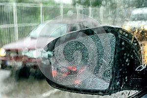 View from the car glass on the rainy day