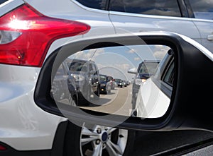 View in car mirror in traffic jam stock photo