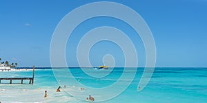 View from Caracol Beach at the Hotel Zone, Cancun with the ferry, beautiful turquoise Ocean