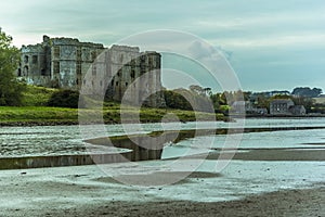 A view of the Carew estuary past Carew Castle towards the Tidal Mill in Pembrokeshire