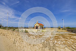 View of the Caribbean coast with small Catholic chapel known as \