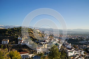 View from Carmen de los Martires Park over Granada and Sierra Nevada, Spain