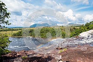 View of Carrao river with Tepuis at the background. Canaima National Park.
