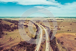 View of cars and trucks driving on Hume Highway.