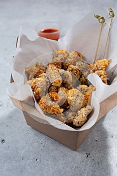 carton of popcorn chicken