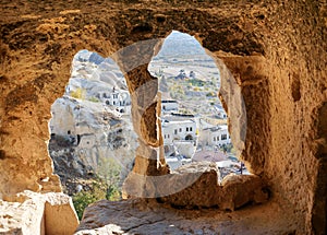 View through carved cave window. Church of St. John the Baptist in Cavusin. Cappadocia. Turkey