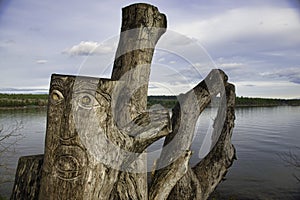 View of carved tree trunk in Transfer Beach in the town of Ladysmith, BC, Canada