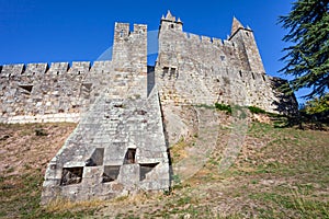 View of a casemate bunker emerging from the walls of the Feira castle. photo