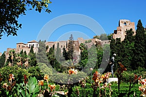 View of the castle seen from the Pedro Luis Alonso gardens, Malaga, Spain.