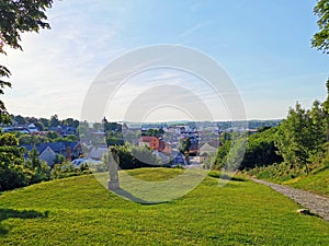 View from the castle to the town of Malenovice, Zlin Region, with a statue of the local Count Jaroslav Sternberg