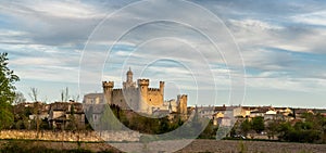 view of the castle and village of Olmillos de Sasamon in north central Spain photo