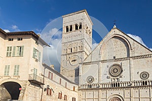 View of Cathedral of San Rufino with blue sky in the background. Assisi