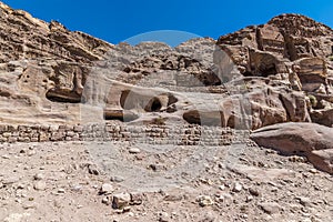 A view of cave dwellings beside the Royal Tombs in the ancient city of Petra, Jordan