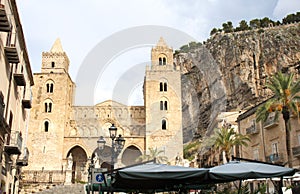 View of Cefalu`s cathedral and rock Rocca di Cefalu, Sicily, Italy